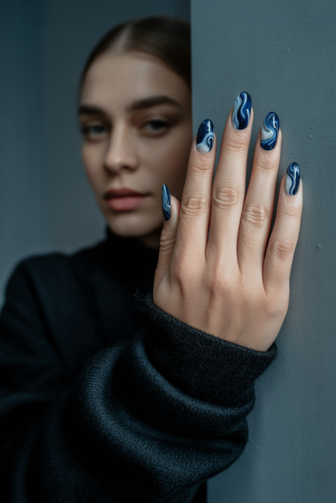 18 Stunning Trendy Blue Nails Design for Every Style and Occasion 12 Blue Abstract Swirls